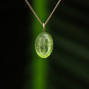 Peridoot met rutiel hanger