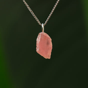 Raw rhodochrosite pendant