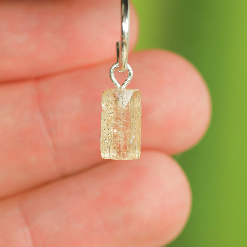 Goudtopaas oorringbedel