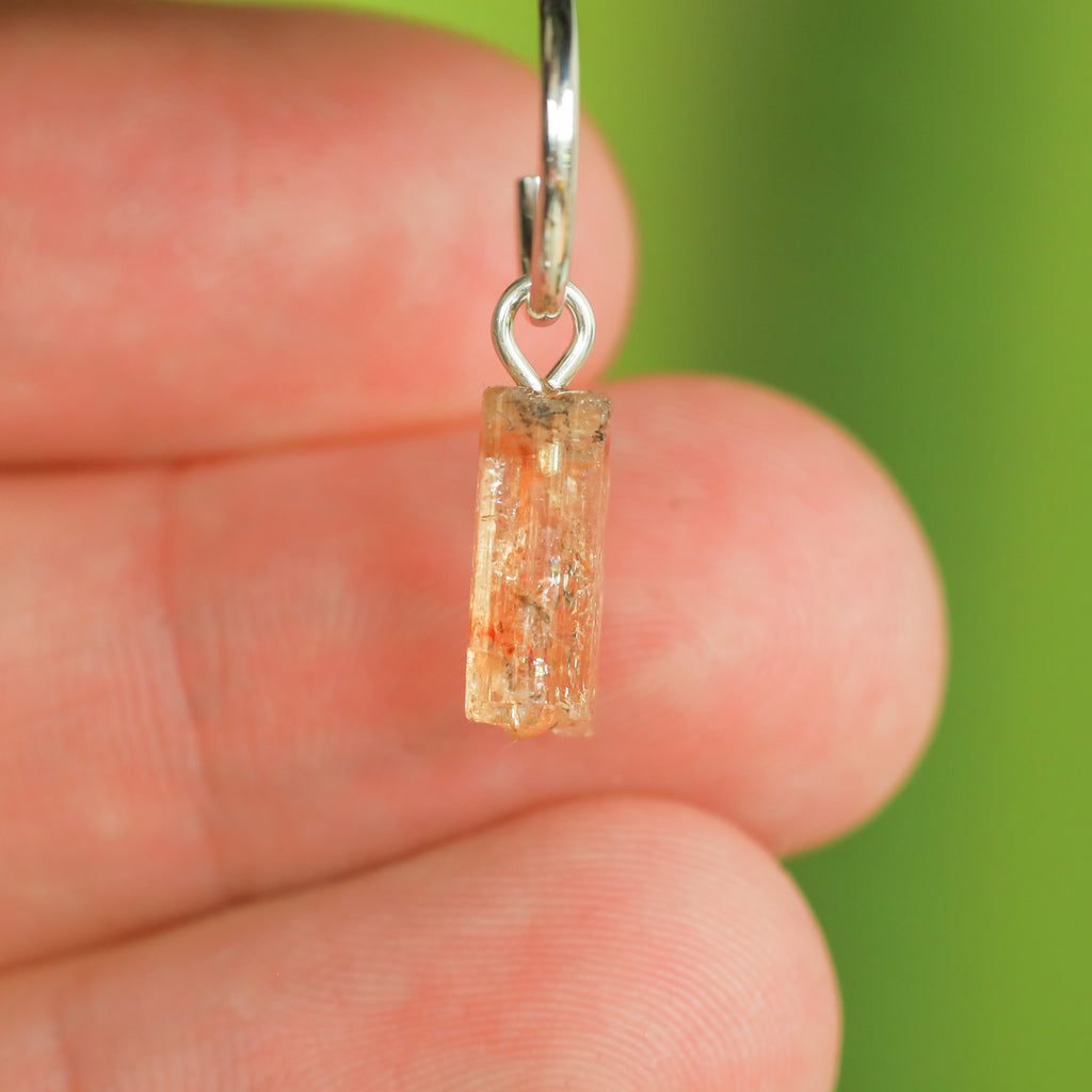 Goudtopaas oorringbedel