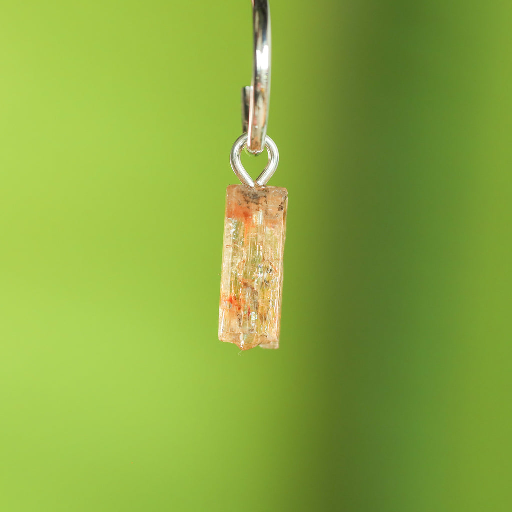 Goudtopaas oorringbedel