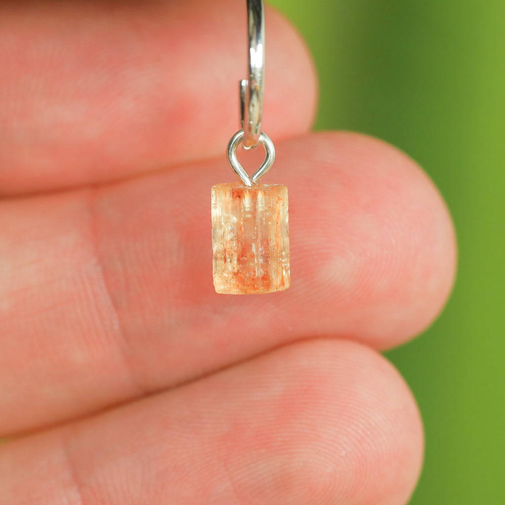 Goudtopaas oorringbedel