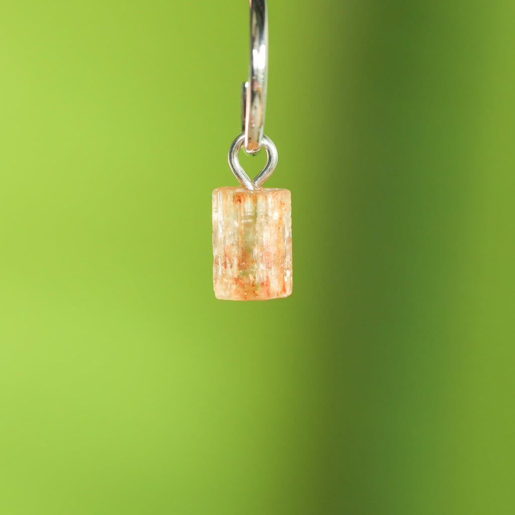 Goudtopaas oorringbedel