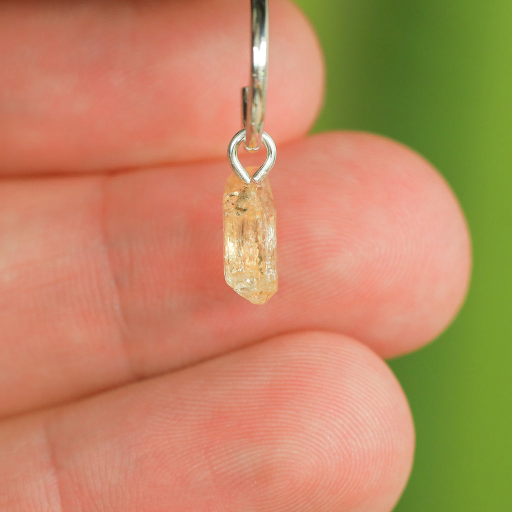 Goudtopaas oorringbedel