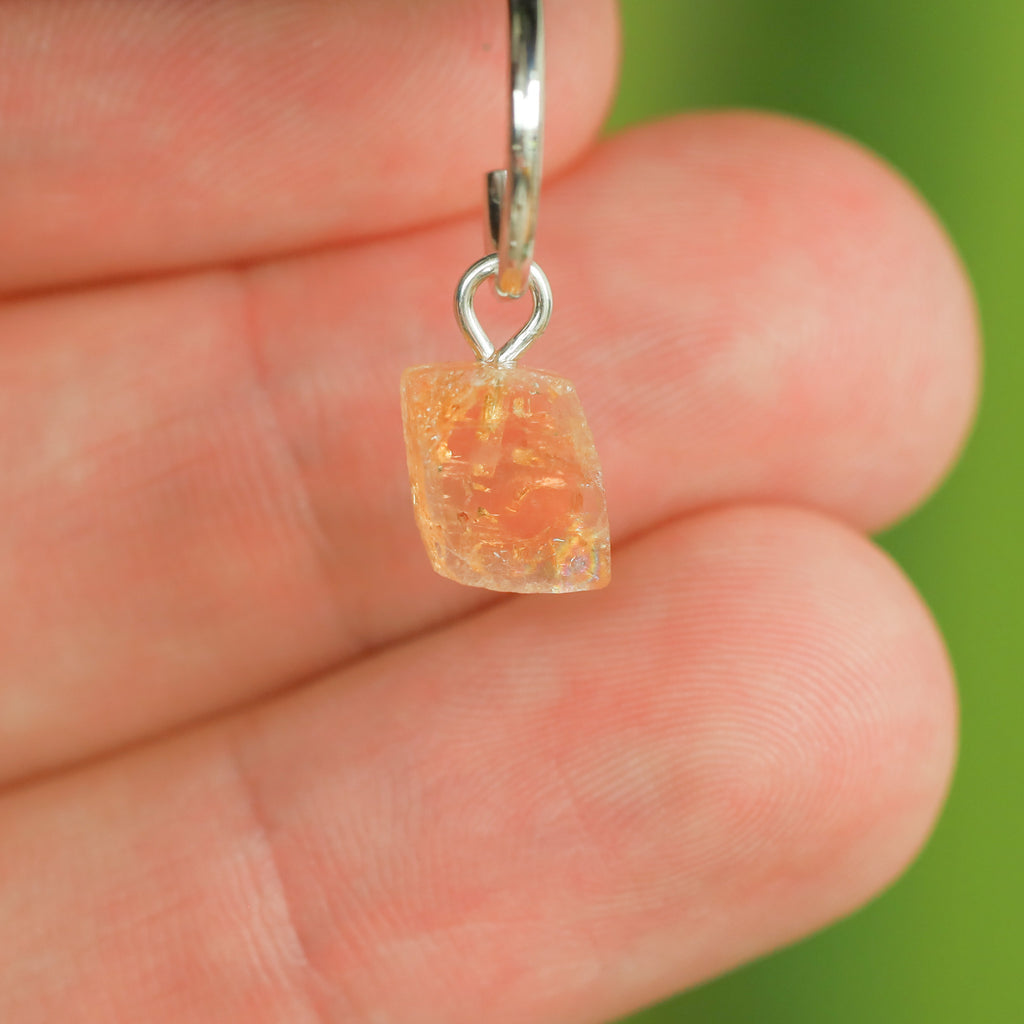 Goudtopaas oorringbedel