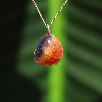 Iolite with sunstone pendant