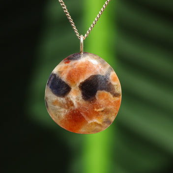 Iolite with sunstone pendant
